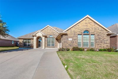 View of front of property featuring a front yard | Image 1