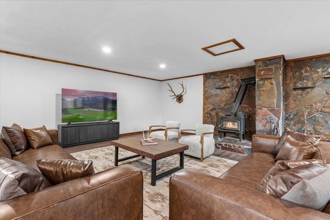 A Wood Burning Stove Upstairs and on Main Floor | Image 37