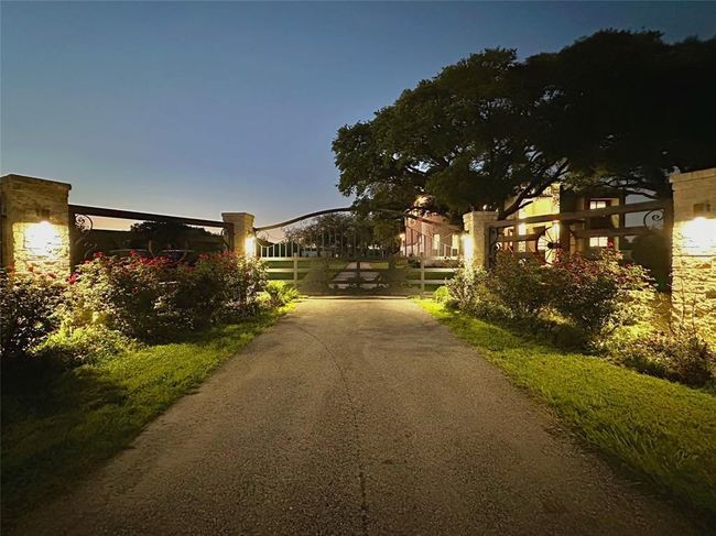 Gorgeous view at dusk of your entry gate to your home. | Image 27