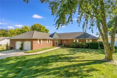 Ranch-style brick home with 2-car garage | Image 1