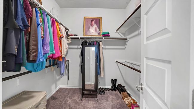 Walk in closet with carpet flooring | Image 21