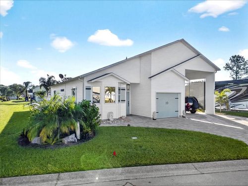 1102 Motorcoach Dr, POLK CITY, FL, 33868-5117 | Card Image