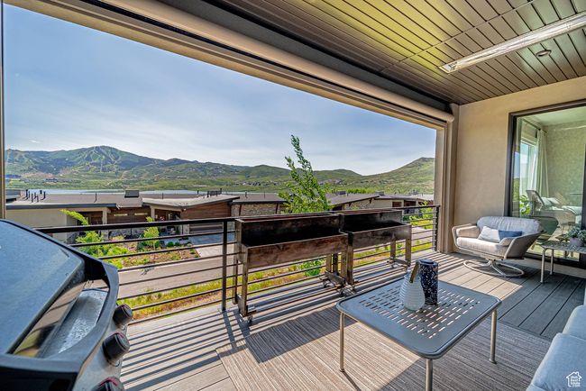 Wooden terrace featuring a mountain view | Image 25