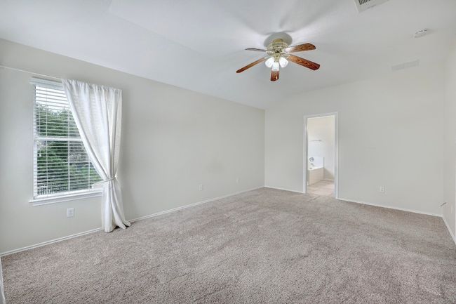 Spacious & serene primary suite | Image 18