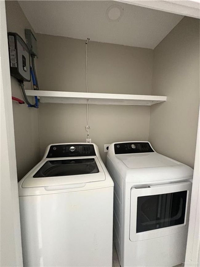 Laundry room featuring washer and dryer | Image 7