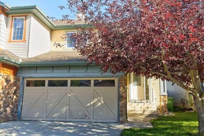 14 Cougar Ridge Bay Sw, Home with 3 bedrooms, 2 bathrooms and 4 parking in Calgary AB | Image 1