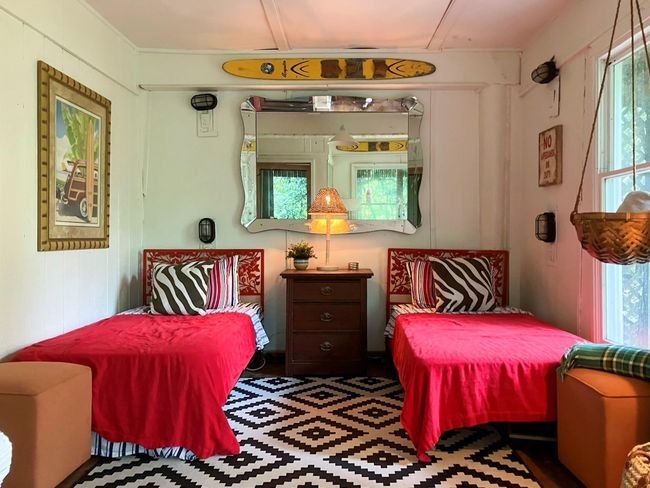 Bedroom featuring multiple windows and attic access | Image 13