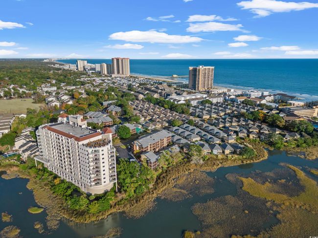 Aerial overview of property's location featuring a nearby body of water | Image 37