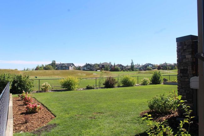 312 Boulder Creek Cres Se, House other with 3 bedrooms, 3 bathrooms and 6 parking in Langdon AB | Image 33
