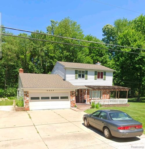 6099 Brookwood Dr, Burton, MI, 48509-1301 | Card Image