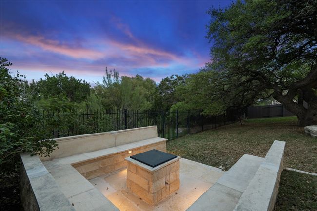 Patio terrace at dusk featuring fence private yard | Image 36