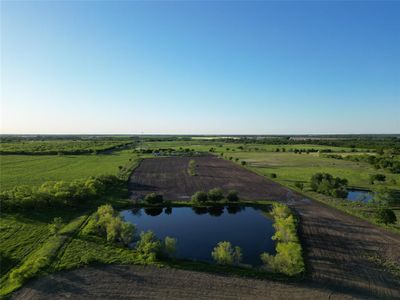 Birds eye view of property with a water view and a rural view | Image 3