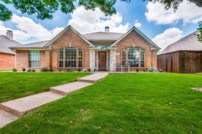 View of front of home with a front yard | Image 1