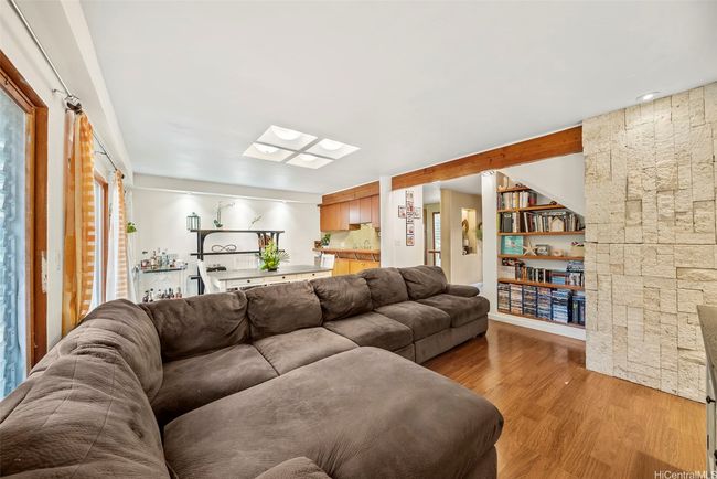 Living room looking towards kitchen/entrance. | Image 9