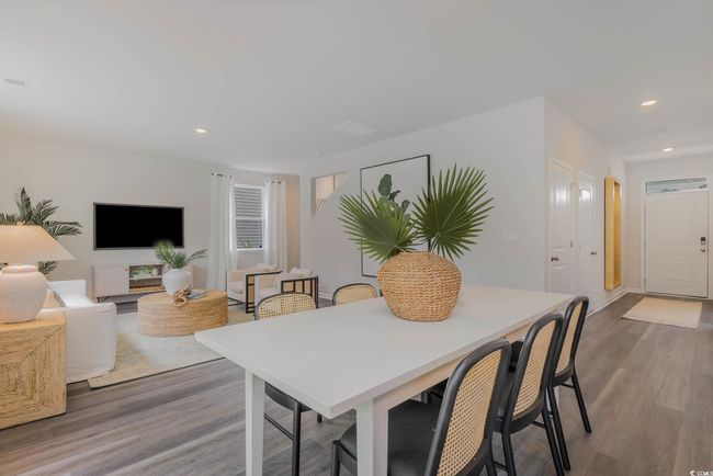 Dining room featuring wood finished floors and recessed lighting | Image 10