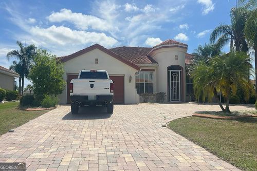 1115 Signature Dr, SUN CITY CENTER, FL, 33573-4414 | Card Image
