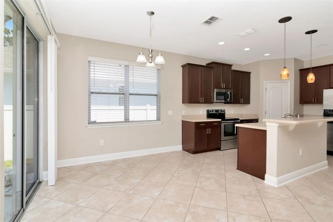 7703 S Fitzgerald St, House other with 4 bedrooms, 3 bathrooms and null parking in Tampa FL | Image 8