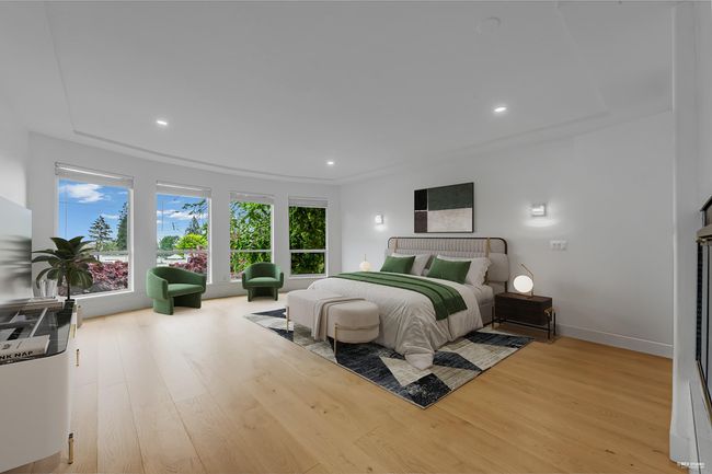 Bedroom featuring wood finished floors, recessed lighting, and baseboards | Image 24