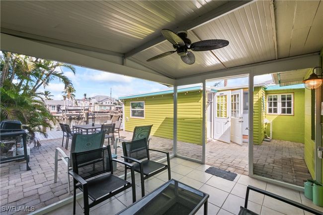 View of patio / terrace with ceiling fan and area for grilling | Image 42