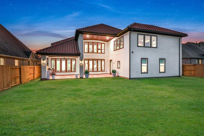 Large backyard with NO BACK NEIGHBORS!! The blank backyard is ready for your custom pool to be installed. | Image 46