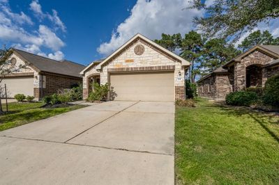 2 car garage with plenty of driveway space for guest parking | Image 3