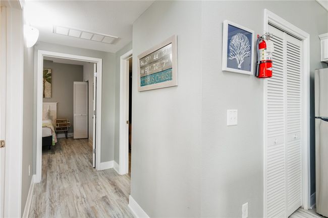 Hallway leading to bedrooms and bathroom. | Image 17