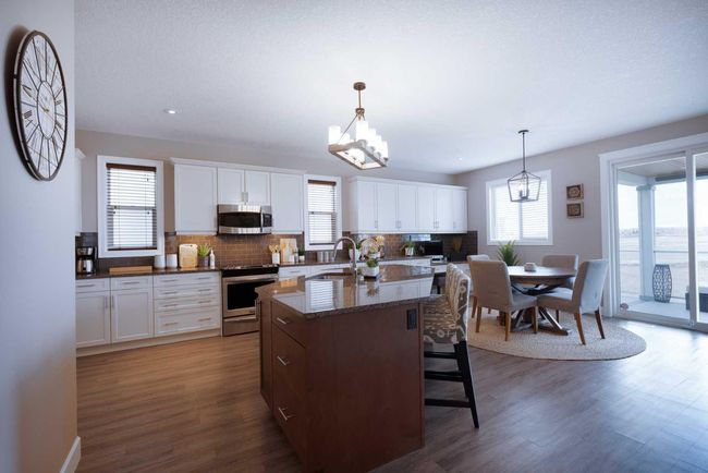 64 Windgate Close Sw, House other with 4 bedrooms, 3 bathrooms and 4 parking in Airdrie AB | Image 6