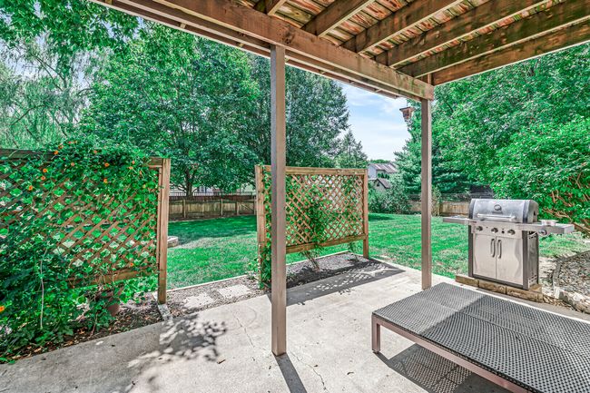 Private patio outside the walk out basement | Image 44