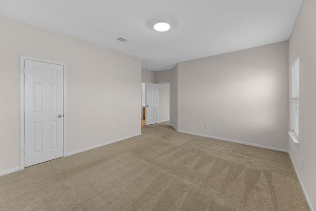 An additional view of your spacious primary bedroom. | Image 18