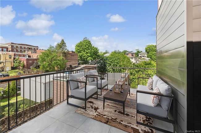 The 150' outdoor space is perfect for entertaining, a bbq, or enjoying a glass of wine gazing at the sunsets over the Hudson. | Image 7