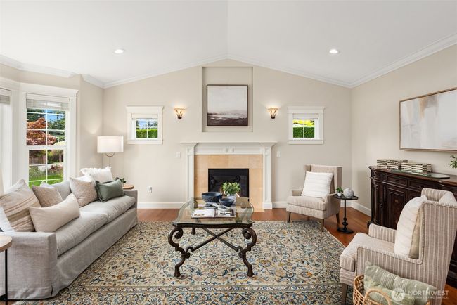 Formal living room with a gas fireplace | Image 4