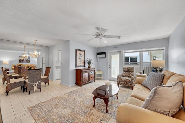 Your Living Room, Dining Area are Bright, Spacious and Great for Quiet Times or Entertaining! Being Sold Furnished, Turn-Key. Impact Windows & Doors also include Blinds and Retractable Screen Doors! | Image 28