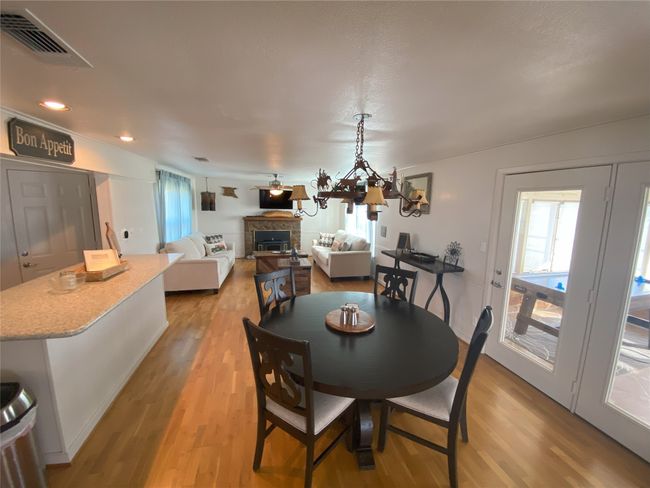 Dining laminate floors, recessed lighting. | Image 7