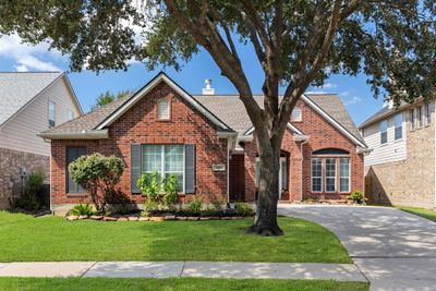 Four sided brick, full gutters and low maintenance landscaping. | Image 2