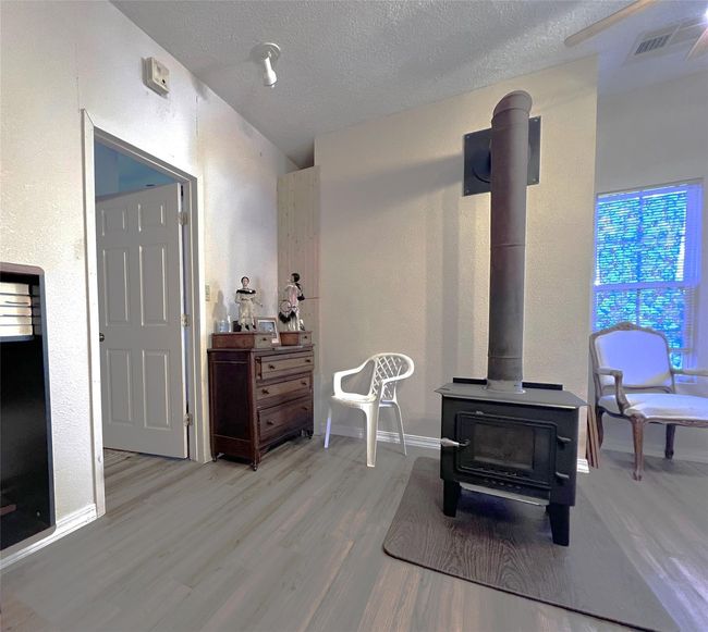 Door on the left leads to the primary bathroom. | Image 31