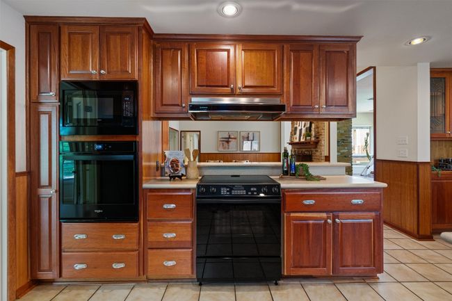 You will enjoy having two ovens in this light filled kitchen | Image 17