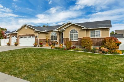 7497 S 4950 West W, House other with 6 bedrooms, 3 bathrooms and 10 parking in West Jordan UT | Image 2