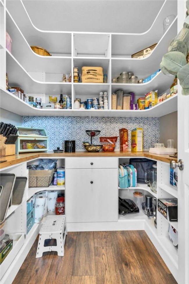 Custom walk in pantry with built-ins. | Image 12