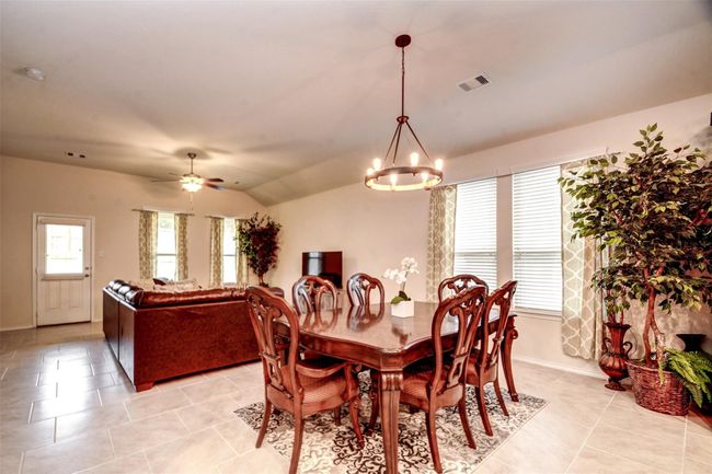 A large window lets in tons of natural light into this beautiful space. | Image 13