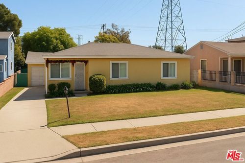 1048 W 125th St, Los Angeles, CA, 90044-1002 | Card Image