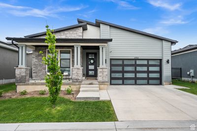 View of front of home featuring a front yard | Image 1