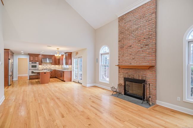 Open floor plan between kitchen and family room. | Image 13
