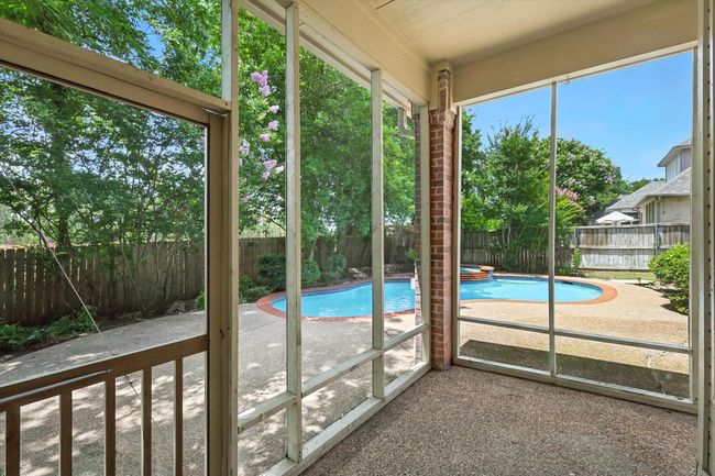 View of unfurnished sunroom | Image 32