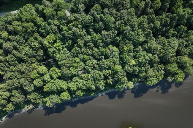 Aerial view featuring a water view | Image 4