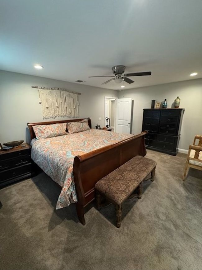 Bedroom featuring recessed lighting, light colored carpet, baseboards, and ceiling fan | Image 8