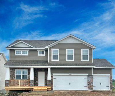 Exterior Northern Craftsman front elevation. Couple items left, but otherwise the interior of the home is complete! | Image 1