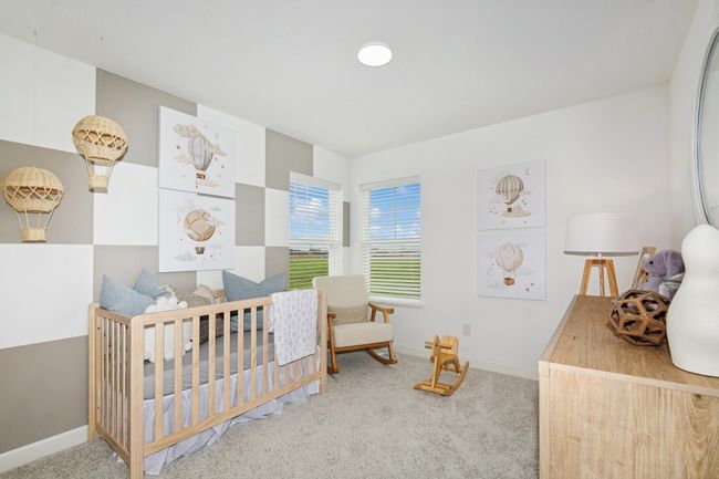 (Photo of decorated model, actual home's finishes will vary) The two secondary bedrooms are perfectly sized and feature a spacious closet. | Image 15