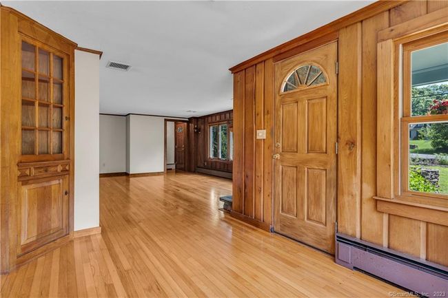 The door leads to a covered front patio. | Image 12