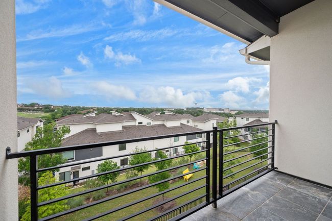 Breathtaking hill country view from Balcony featuring a residential view | Image 19