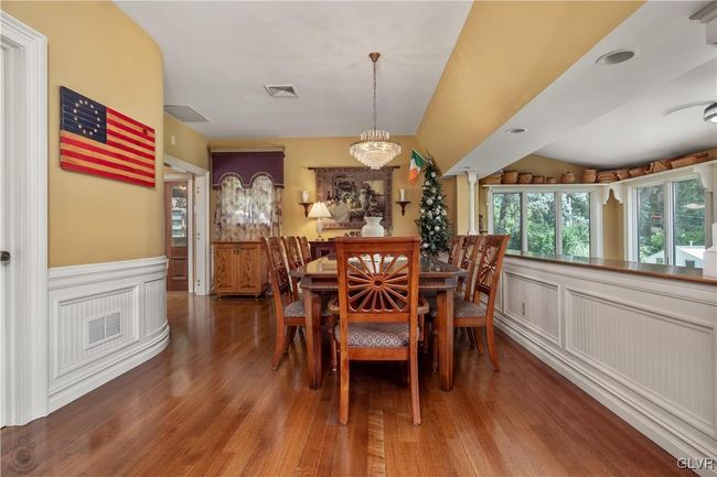 Dining area with Philippine hardwood floors and custom molding | Image 4